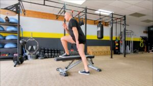 How to do Single Leg Crossover Step-ups. 1 of over 100 exercises in our FREE Exercise Library by USMC Veteran & Personal Trainer Marine Miguel.