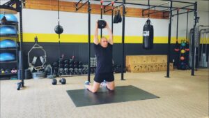 How to do Tall Kneeling Ball Slams. 1 of over 100 exercises in our FREE Exercise Library by USMC Veteran & Personal Trainer Marine Miguel.