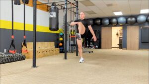 How to do Walking Lunges - with a knee drive at the top every lunge. 1 of over 100 exercises in our FREE Exercise Library by USMC Veteran & Personal Trainer Marine Miguel.