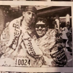 Marine Miguel at the LA Marathon finish line with his Dad